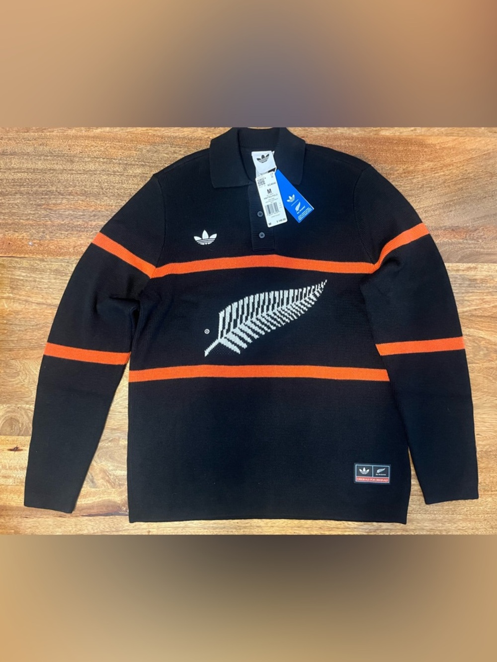 Adidas Black Polo Knit Shirt with Orange Stripes and White Fern